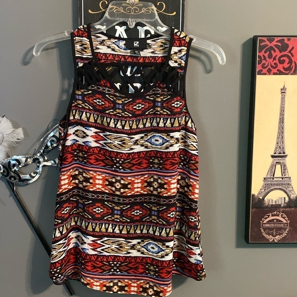 IZ Byer sleeveless blouse with cross cross panel on back. size XS